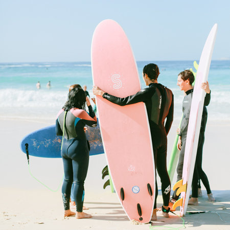 PenelopeTemplate]photo-of-people-holding-their-surfboards-1697305