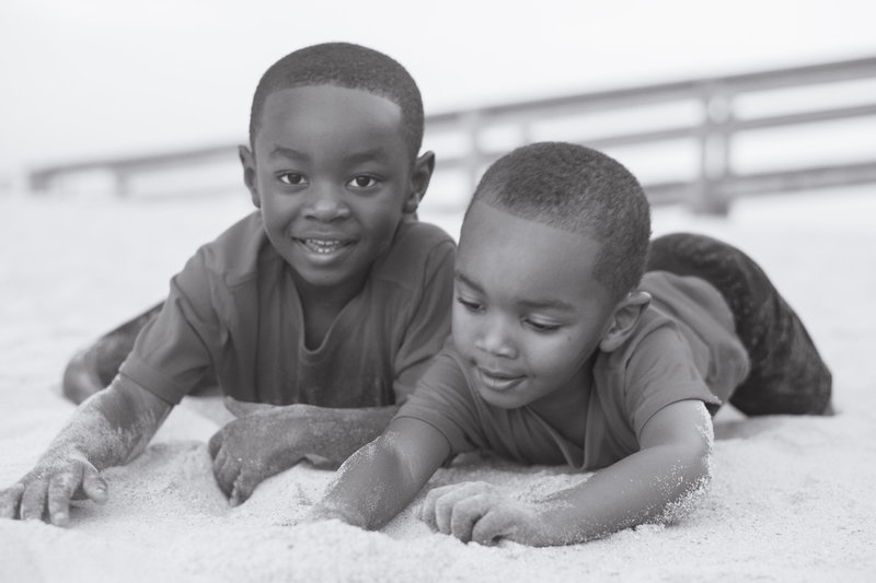 Boys playing in the sand
