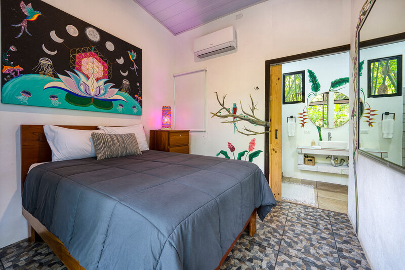 Lotus and Madre Tierra Rooms - Each with 1 full size bed and together a shared bathroom  (1)