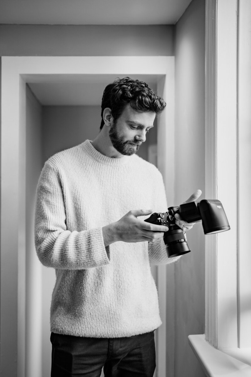 man holding camera