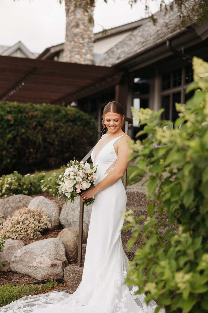 Bride with her wedding bouquet smiling