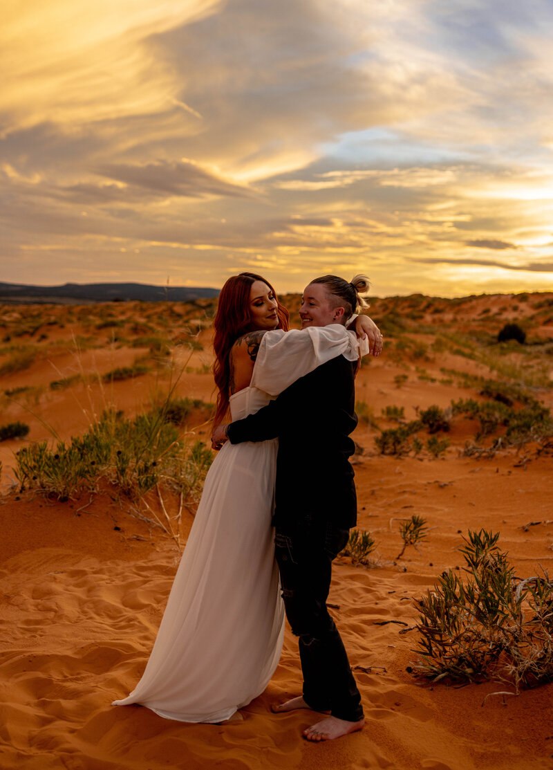 lgbtq+ couple eloping in the sand dunes in Utah