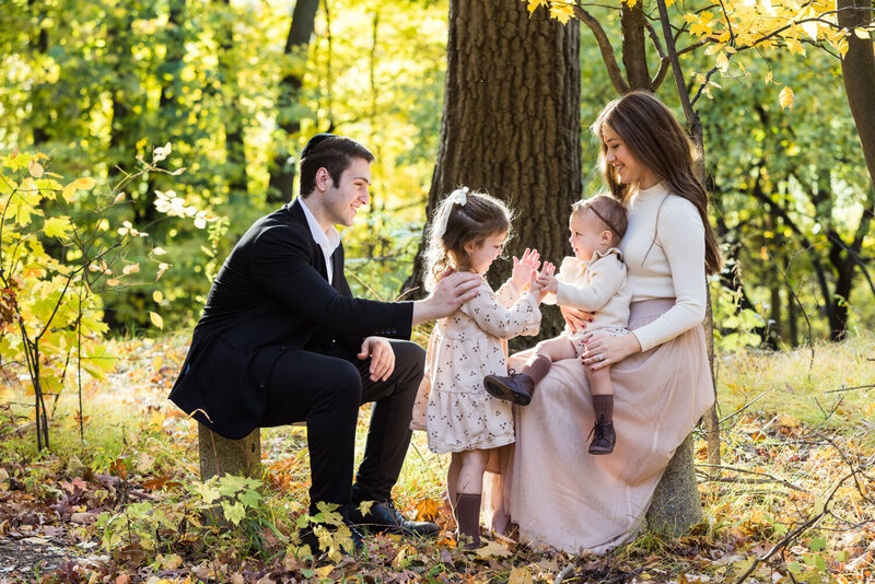 Family portrait in an outdoor and greenery setting