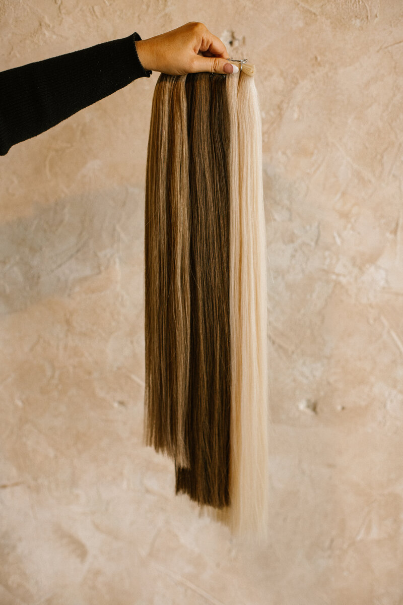 Find Knoxville's best hair extension stylist at Knoxville Hair Co. Our extensions specialist will transform your look with their expertise in fusion, tape-in, and microbead methods.