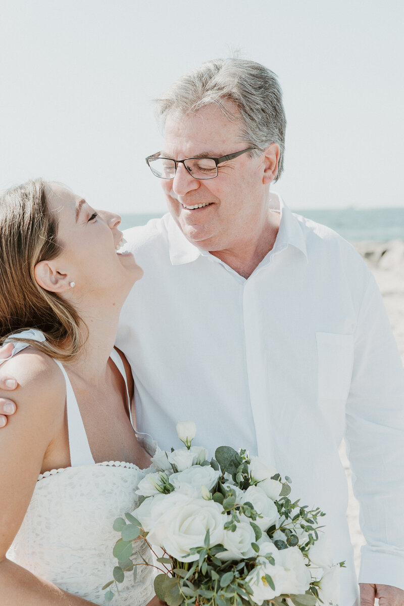 Bride and her dad laughing at San Diego elopement