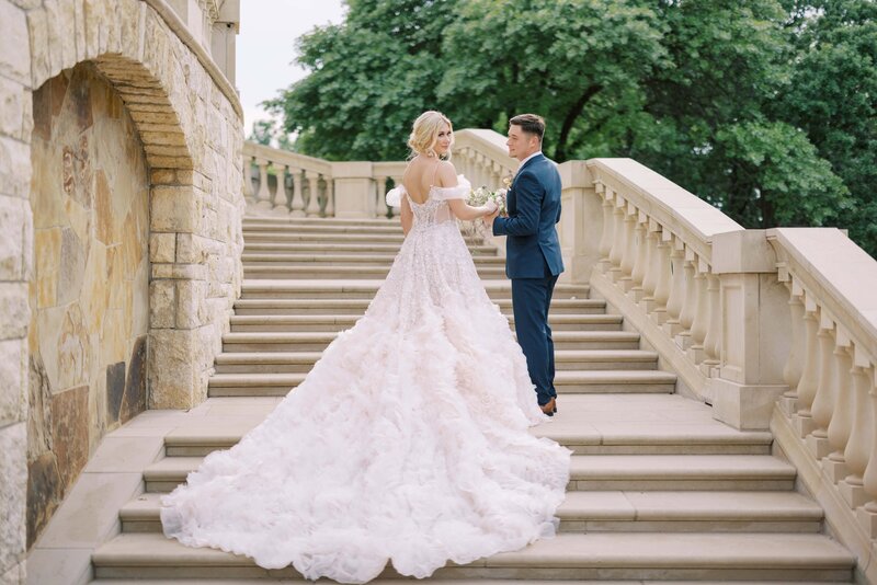 couple walking up a stair chase