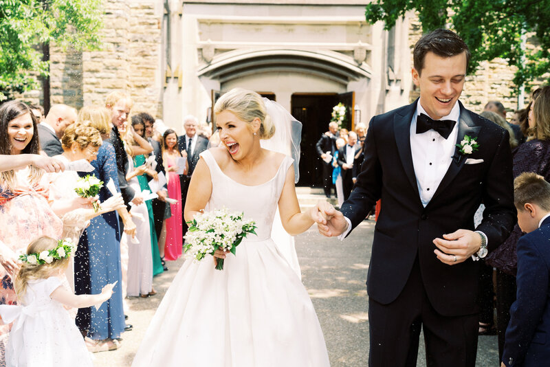Bride and groom exiting their wedding ceremony at Scarritt Bennett in Nashville