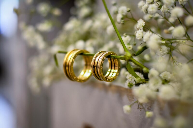 Gold wedding rings with flowers