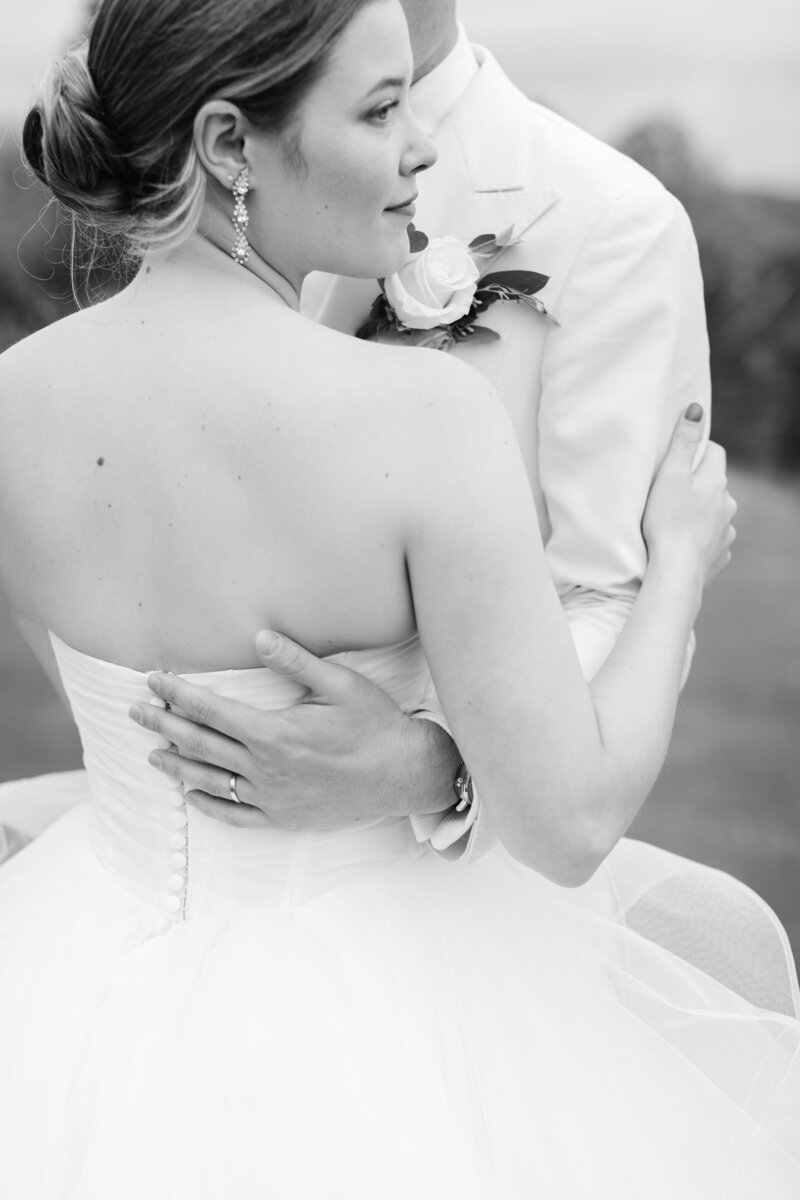 groom-bride-cuddling-portrait