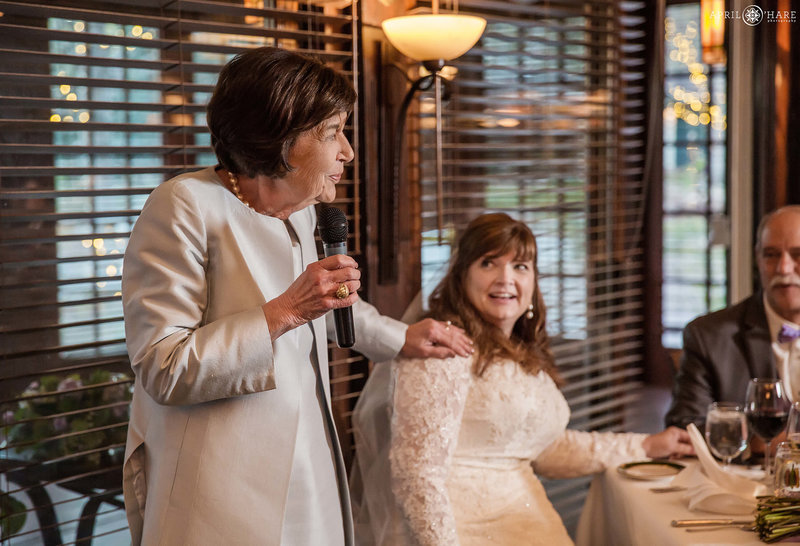 Mother of the bride gives a toast inside the Main Dining Room of the Greenbriar Inn