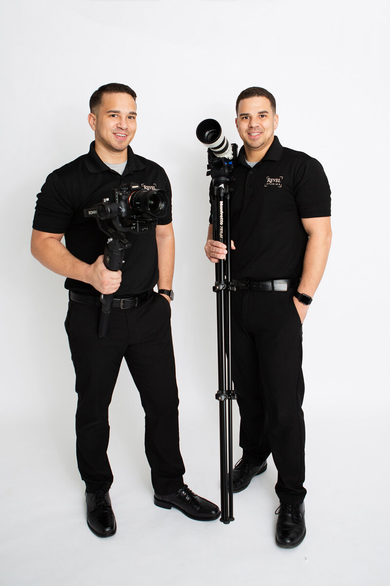 nj wedding videographers posing with camera gear