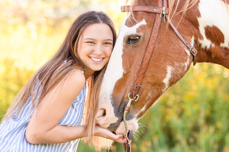 Headshot of girl and pony