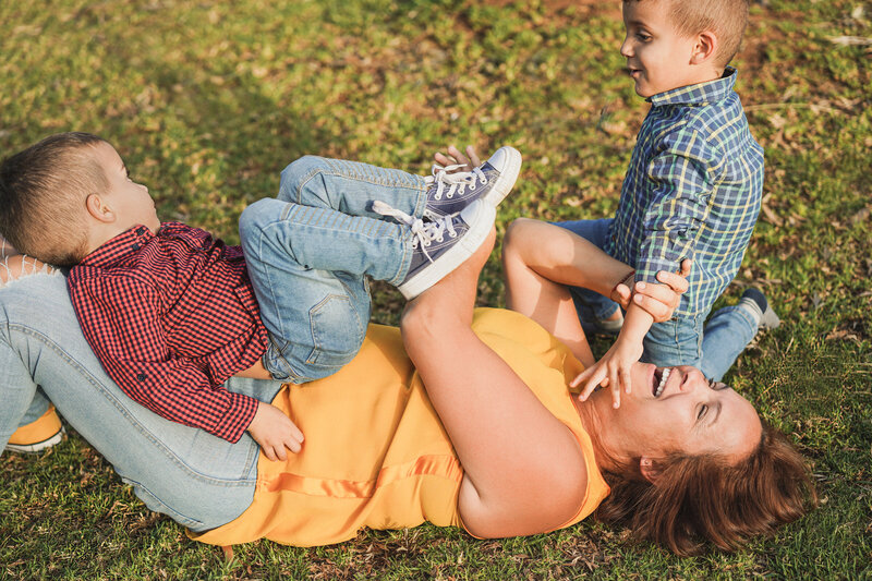 mother-having-cheerful-moment-with-her-twin-sons-2023-11-27-05-06-01-utc