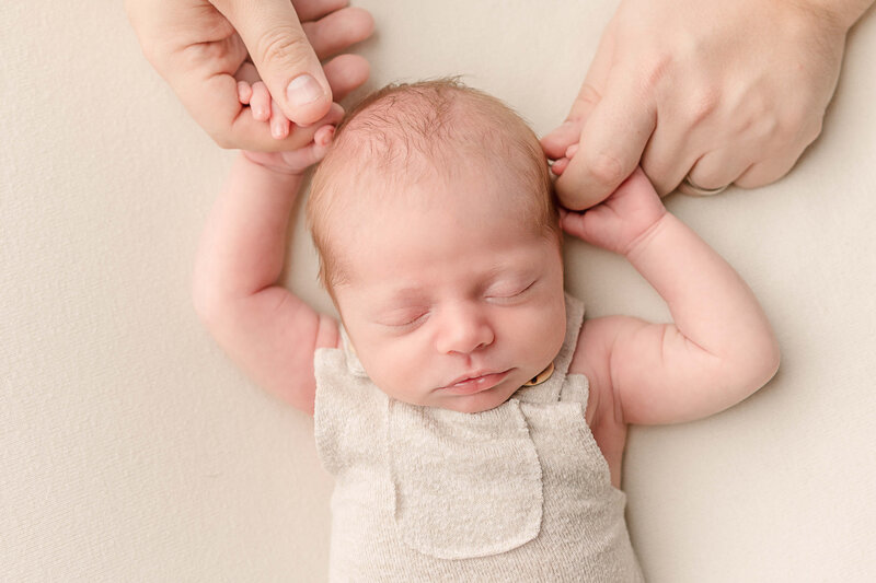 baby newborn girl wearing pink in Portland Oregon Baby Photography session