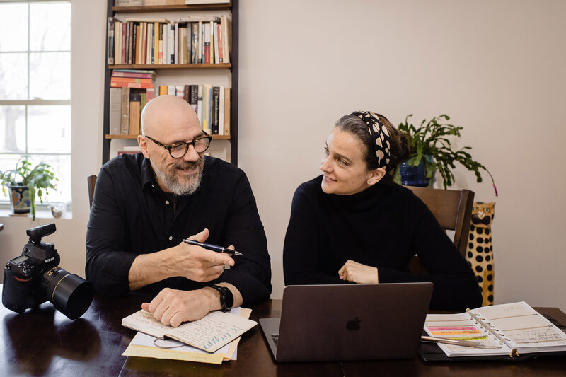Photo of Erin and Peter mentoring a client