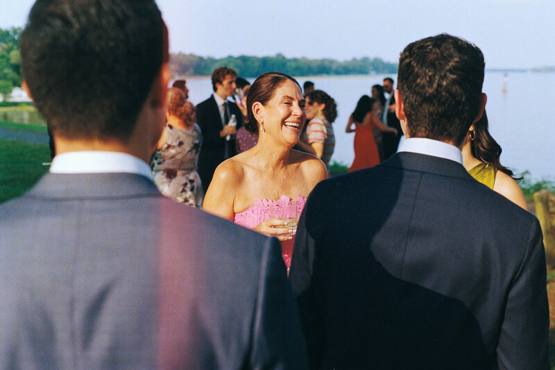 Mother of groom laughing at Glen Foerd Estate in Philadelphia, PA