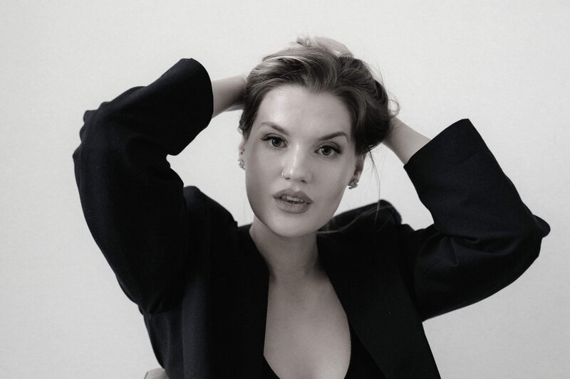 Woman in Black Blazer
