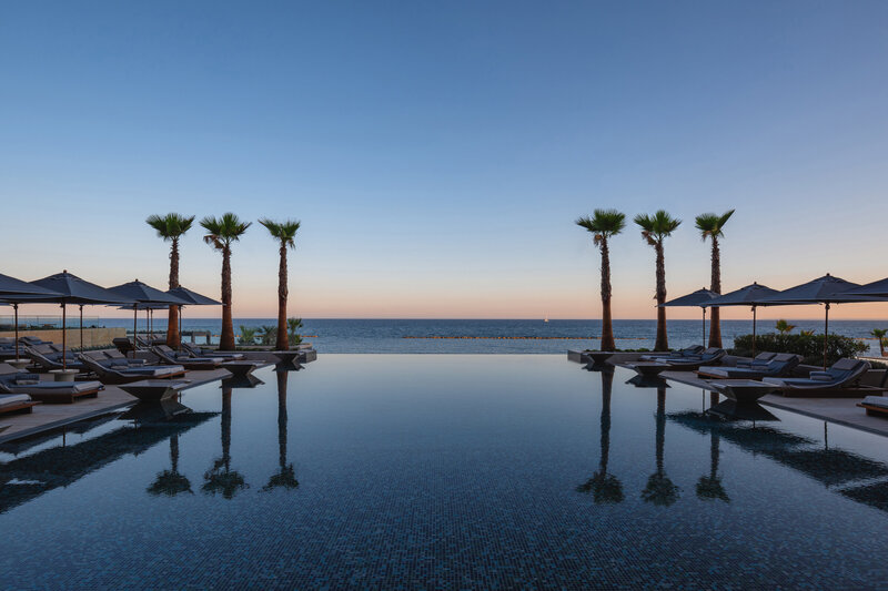 Waterstone - AMARA Hotel - Limassol - Luxury Boutique Hotel - Infinity-edge-pool-sunset