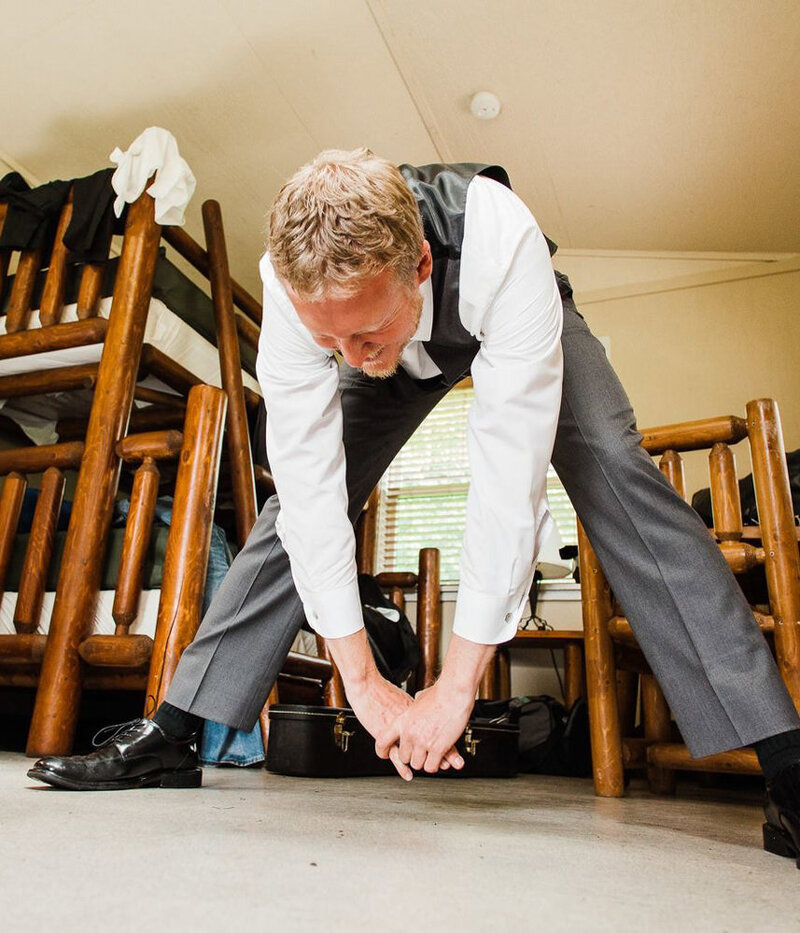 A groom stretches before his wedding day on the Kitsap Peninsula