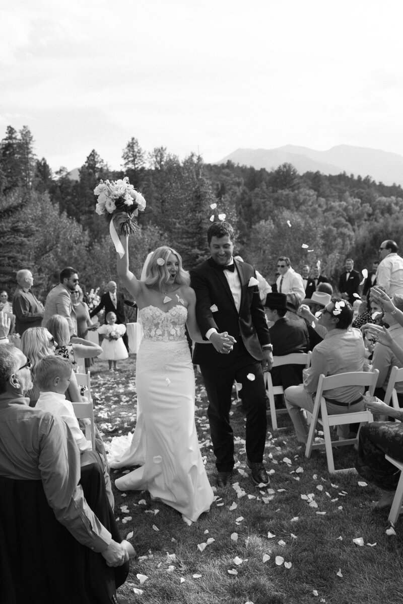 Bride and groom celebrating after their ceremony at a Wisconsin wedding.