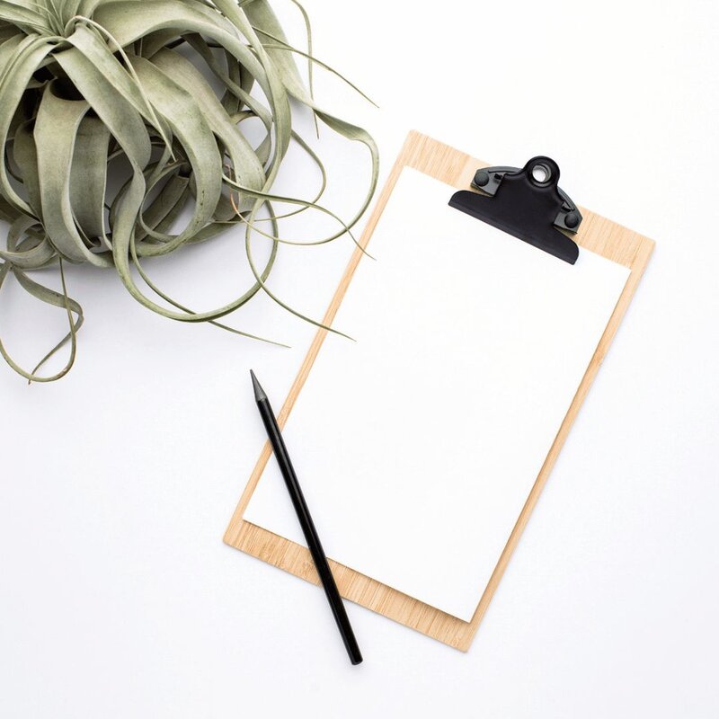 clipboard with pen and blank  paper