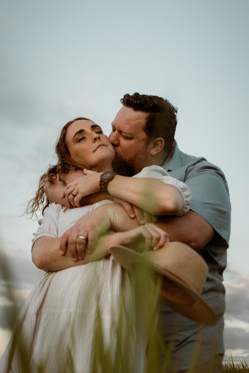 Couples photo lots of hugs with mum and dad in Brisbane Photoshoot location