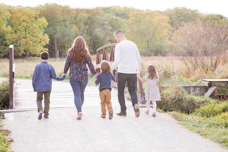family photographer michigan lifestyle walking bridge