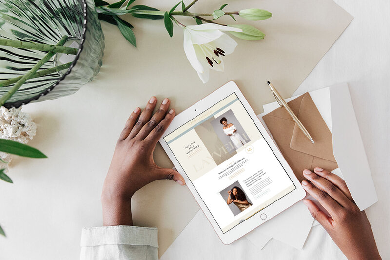 Someone holding ipad with mockup of work by showit designer for photographers Palme Design Co