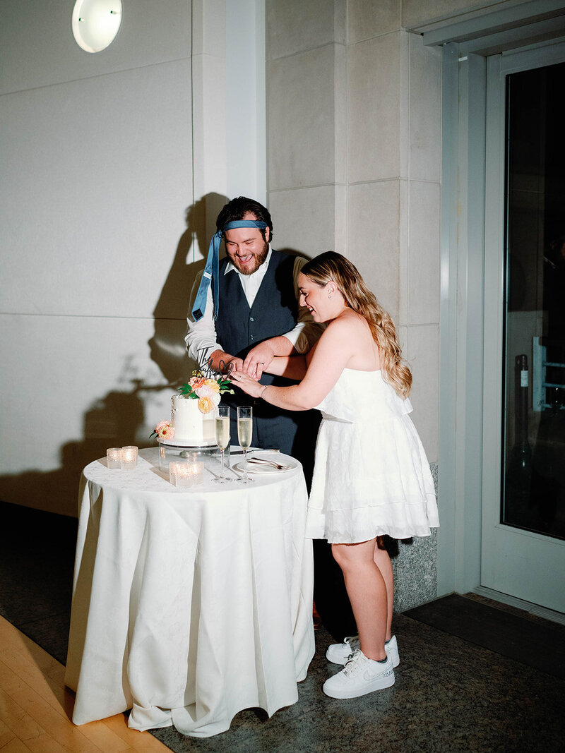 Wedding reception at Ronald Reagan Center Cake cutting flash photo
