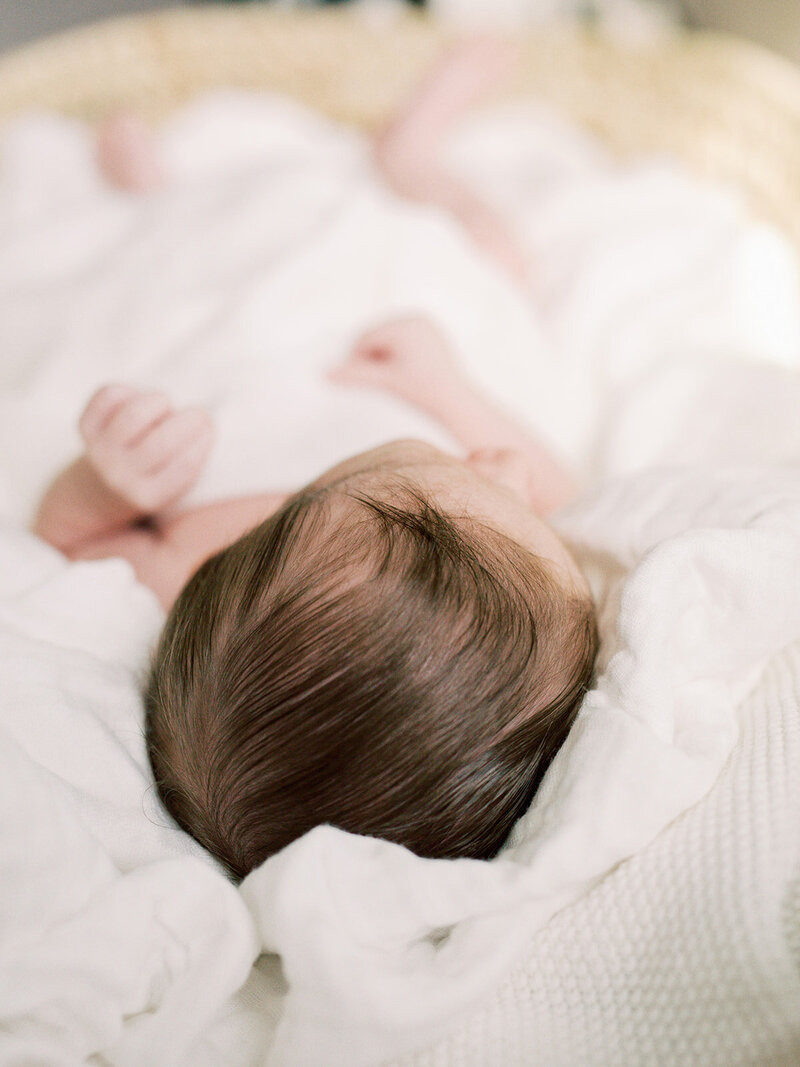 A close-up of a baby's head of hair at a newborn photography session in Richmond by Katie Stansfield Photography.