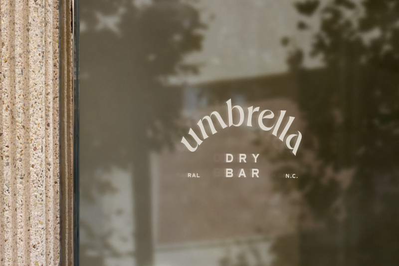 Umbrella Logo Mockup on Window
