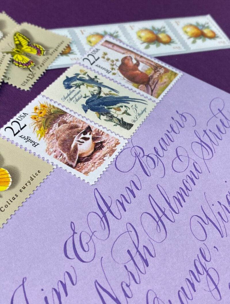 Purple envelope with custom calligraphy