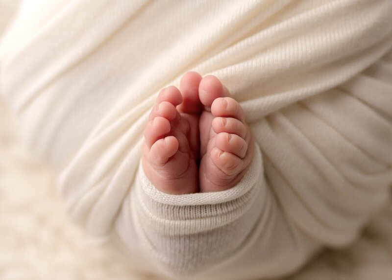 Newborn Baby Toes Wrapped  in cloth
