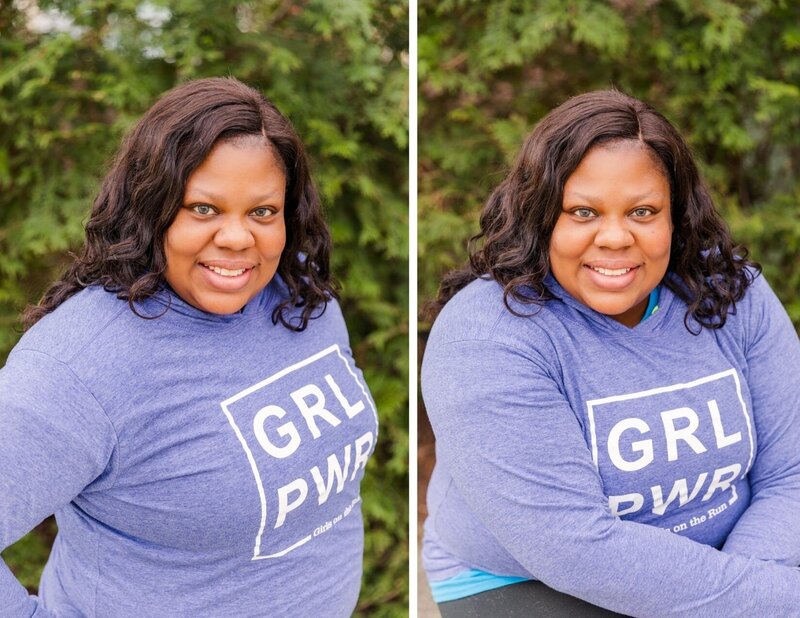brown skin women headshot smiling with blue sweater in a park in Atlanta by Laure Photographyheadshot in studio and in office women in blue and green in Atlanta by Laure Photography
