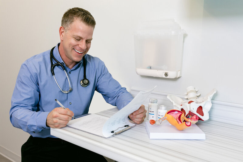 Dr. Ben Barenberg, integrative medicine specialist at Prime Wellness in Oklahoma City, guiding medical trainees through clinical mentorship and education.