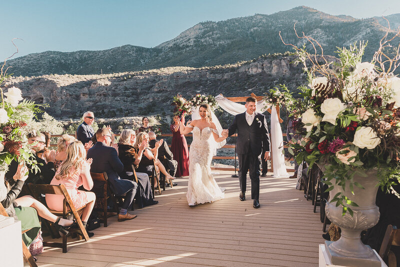 bride and groom celebrate after wedding ceremony at the lodge on charleston peak mt charleston in las vegas
