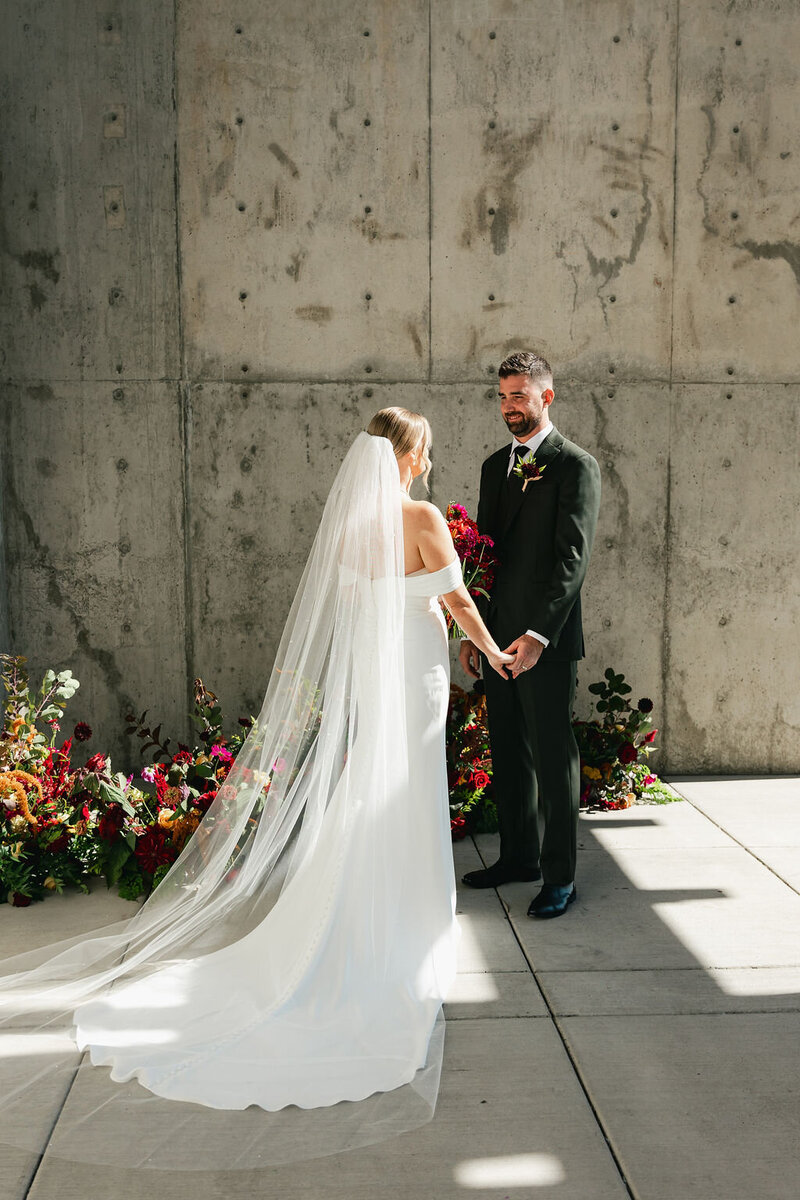 a bride and groom posing on their wedding day at Amaterra Winery in Portland Oregon