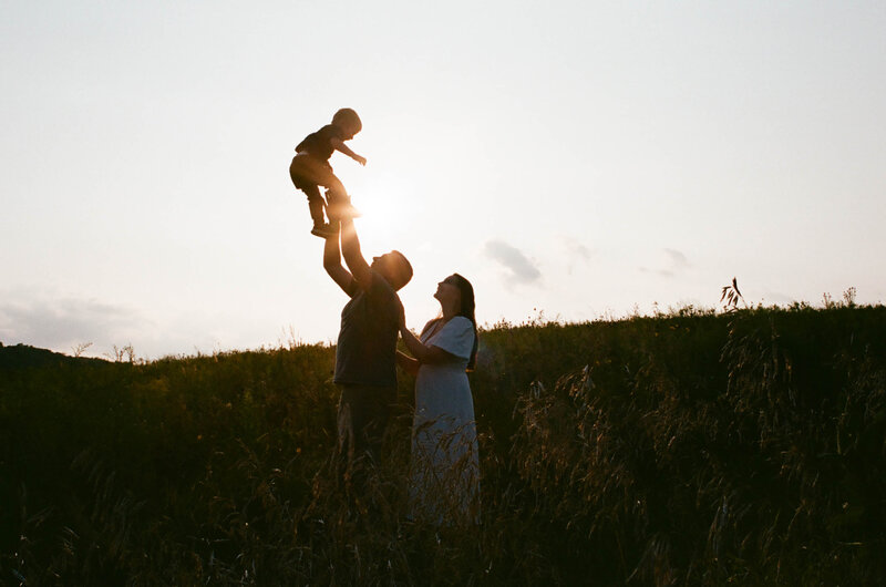 pregnant woman with husband and small child in cross plains, wi maternity session