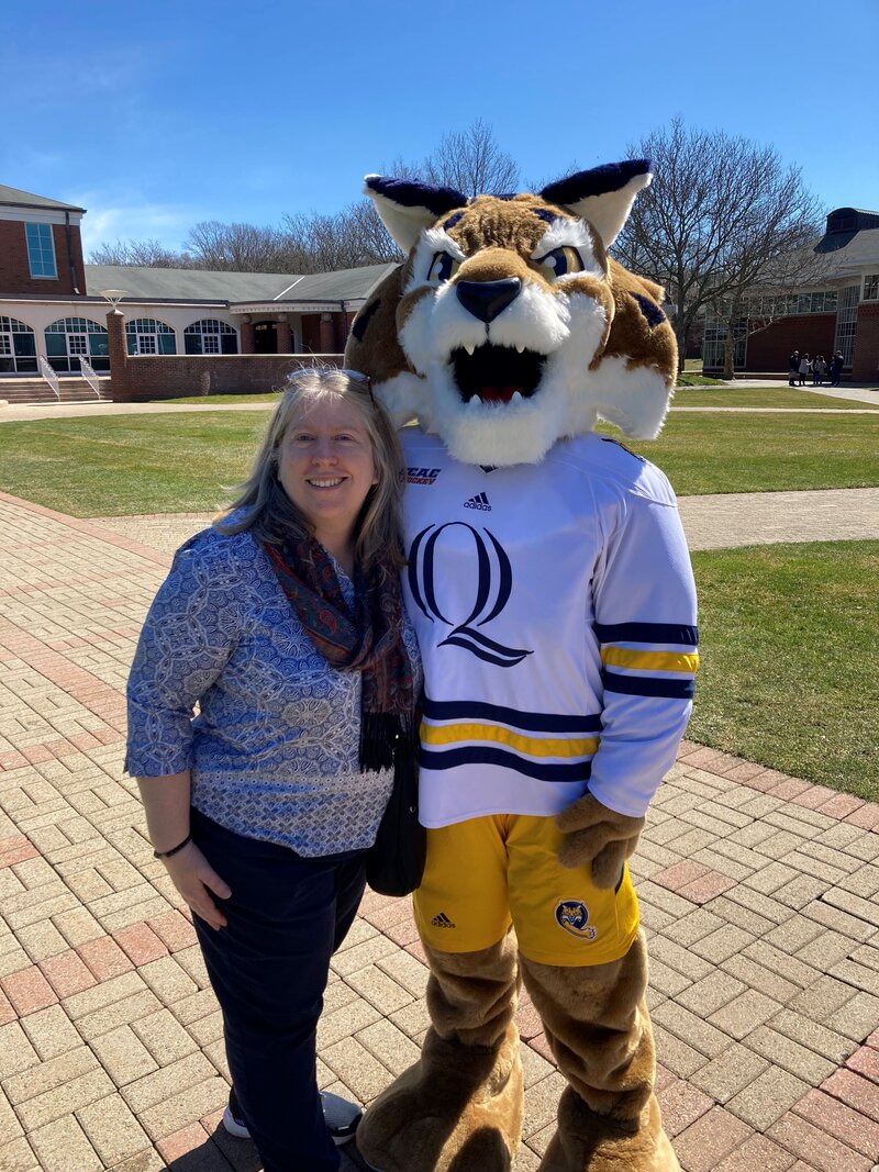 Lisa Rielage and Quinnipiac University mascot Boomer the Bobcat