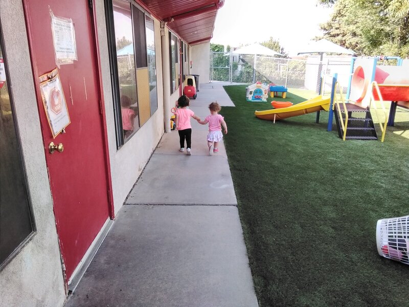 Young Kids Playing Outside CPC Albuquerque Daycare
