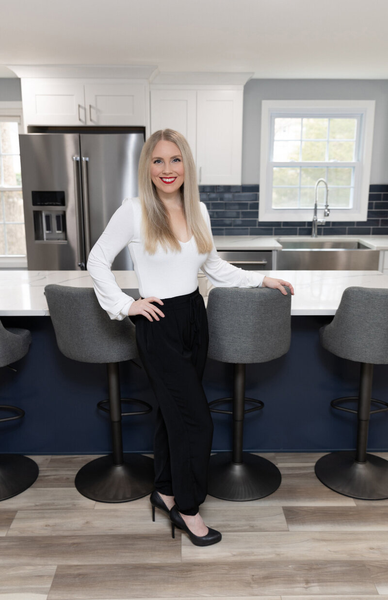 Kristyn standing in her kitchen smiling