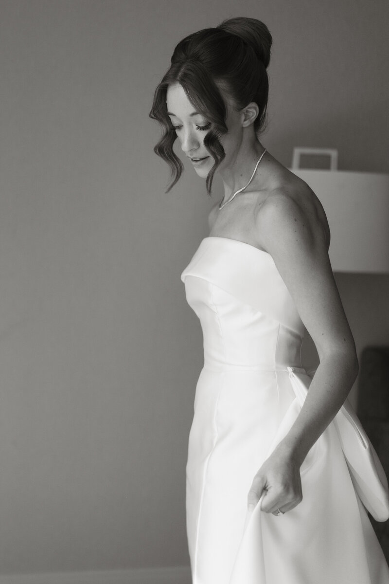 Timeless black and white bridal portrait captured by Jessica from Rainstorm Photo & Video, focusing on elegant simplicity and emotion.