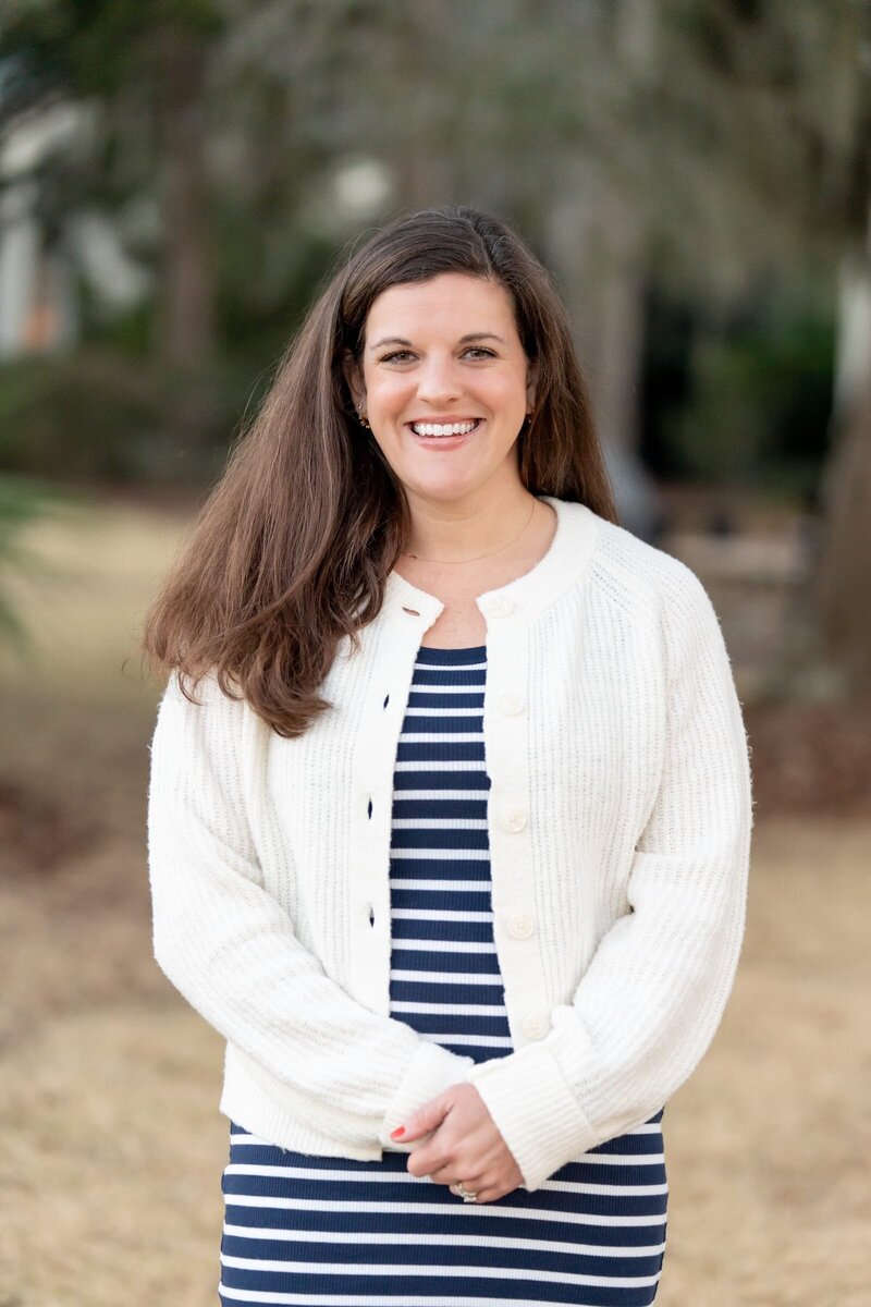 Professional headshot of Hillary Taylor, founder and lead travel consultant at Taylored Travel, showcasing her expertise in crafting luxury travel experiences.
