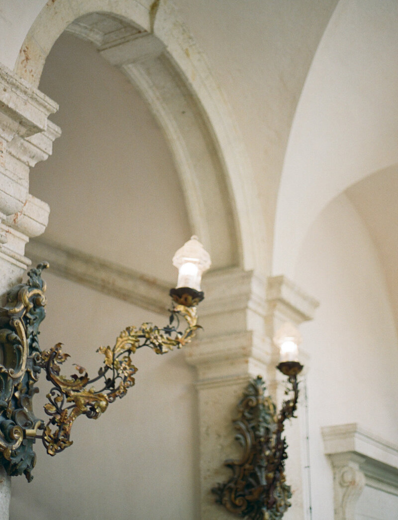 ornate gilded lamp detail, arches architecture at Vizcaya, Miami film wedding photographer 