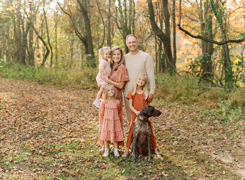 Family portrait of family with 3 daughters and a dog of Raleigh newborn photographers A.J. Dunlap