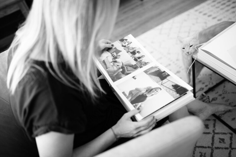 Mother looking at Orlando Family Photography album