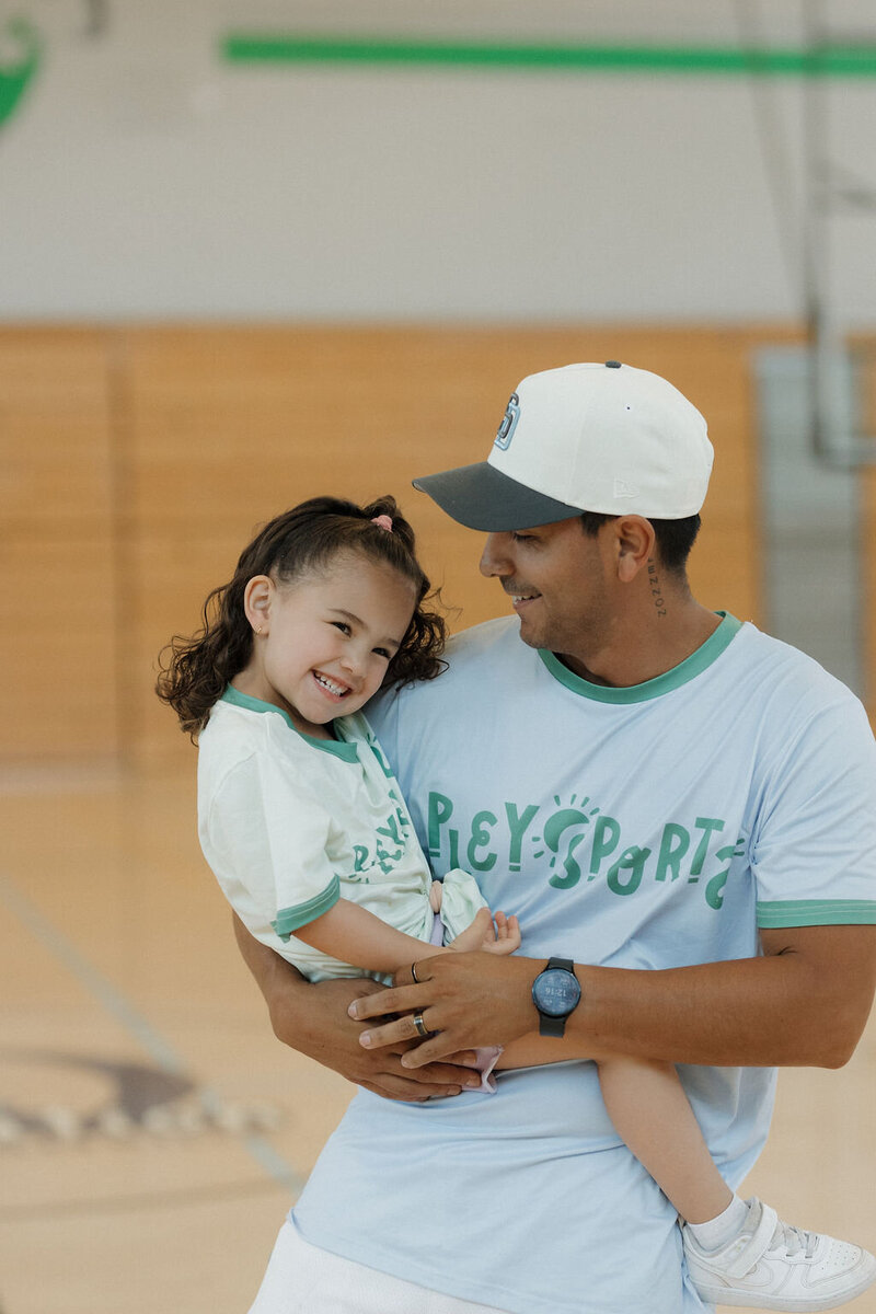 Coach and kid smiling