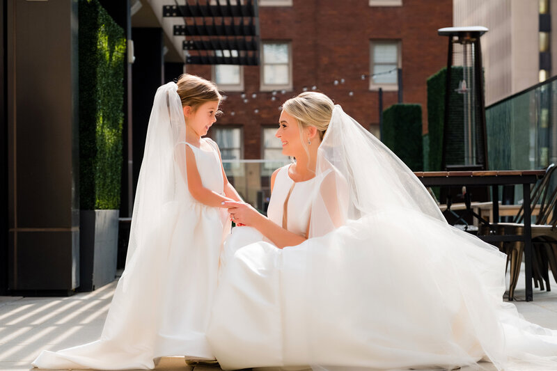 bride and daughter in wedding photo on hotel monaco pittsburgh rooftop