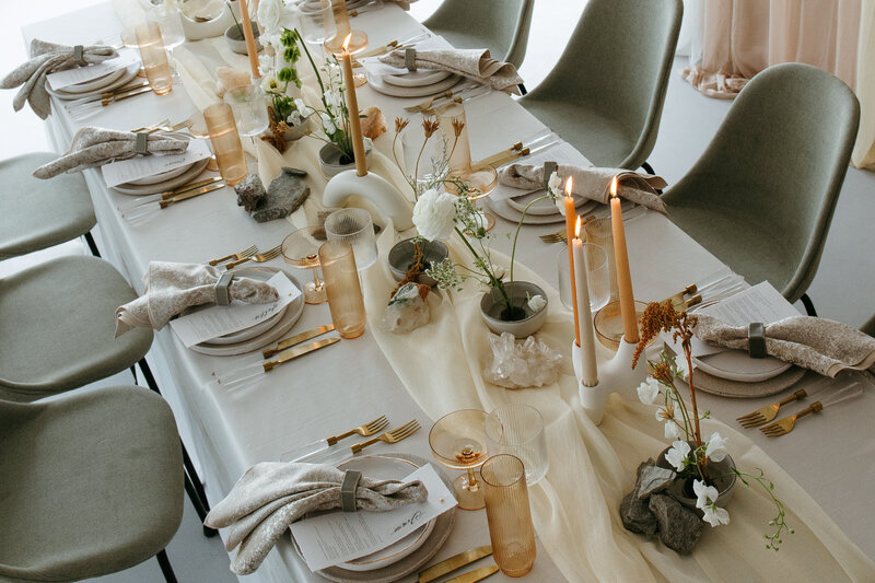 aisle for all mobility styled shoot elegant modern tablescape mixing rocks with beautiful florals