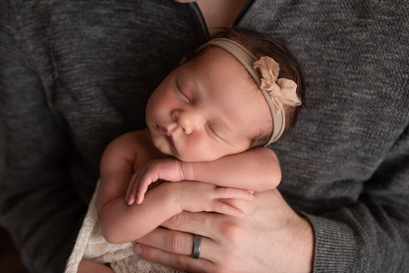 Fond du Lac Newborn Photo baby in daddy's hands | Glory Be Photography by Tara Bos